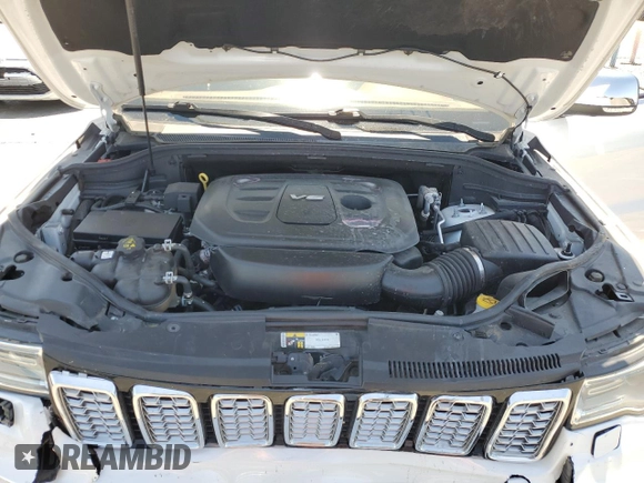 2018 Jeep Grand Cherokee Summit with VIN 1C4RJEJG9JC212554, listed as a Copart auction lot 63123065 with 82,976 mi miles and Salvage title. Bid and sale history available at DreamBid. Image 12.