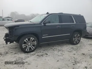 2018 GMC Yukon Denali with VIN 1GKS2CKJ2JR268981, listed as a Copart auction lot 49140145 with 81,586 mi miles and Salvage Title. Bid and sale history available at carsss.com. Image 1.