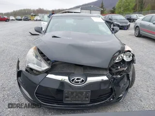 2012 Hyundai Veloster w/Gray Int z VIN KMHTC6AD6CU054422, wystawiony jako IAAI lot #41930634 z przebiegiem 144 681 mil mil oraz . Historia ofert i sprzedaży dostępna na DreamBid. Obrazek 13.