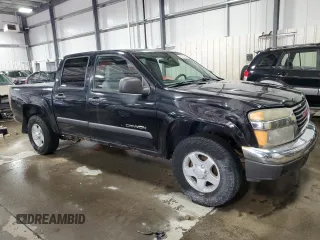 2004 GMC Canyon 1SB SLE Z85 with VIN 1GTDT136348114628, listed as a Copart auction lot 52105615 with 244,232 mi miles and Salvage Title. Bid and sale history available at carsss.com. Image 4.