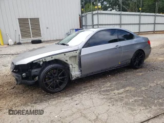 2011 BMW 3 Series 335i with VIN WBAKG7C51BE599093, listed as a Copart auction lot 58470285 with 122,246 mi miles and Salvage title. Bid and sale history available at DreamBid. Image 1.