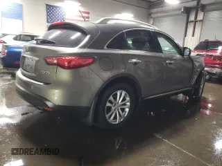 2014 Infiniti QX70 z VIN JN8CS1MW5EM412429, wystawiony jako Copart lot #82933934 z przebiegiem Nie podano mil oraz Szkoda całkowita • Salvage title. Historia ofert i sprzedaży dostępna na DreamBid. Obrazek 3.