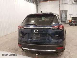 2016 Mazda CX-9 Grand Touring with VIN JM3TCBDY9G0109770, listed as a IAAI auction lot 41551085 with 131,812 mi miles. Bid and sale history available at carsss.com. Image 17.