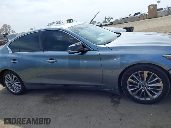 2018 Infiniti Q50 3.0t LUXE with VIN JN1EV7AP9JM352079, listed as a IAAI auction lot 42030404 with 62,550 mi miles. Bid and sale history available at carsss.com. Image 13.