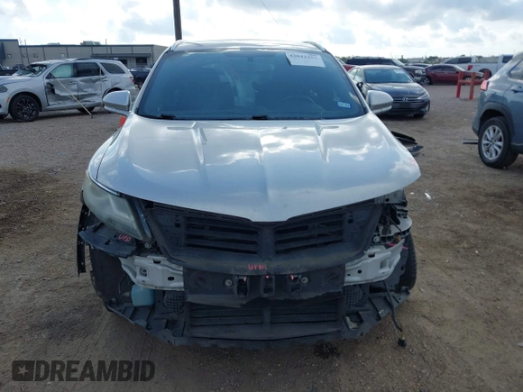 2015 Lincoln MKC z VIN 5LMCJ1A91FUJ13477, wystawiony jako IAAI lot #42042457 z przebiegiem 134 046 mil mil oraz . Historia ofert i sprzedaży dostępna na DreamBid. Obrazek 13.