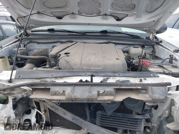2013 Toyota Tacoma z VIN 5TFLU4EN2DX076815, wystawiony jako IAAI lot #41344839 z przebiegiem 311 083 mil mil oraz . Historia ofert i sprzedaży dostępna na DreamBid. Obrazek 10.