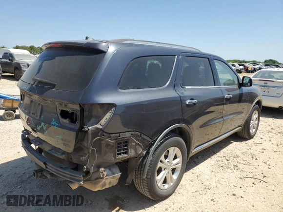 2013 Dodge Durango Crew with VIN 1C4RDJDG5DC686680, listed as a Copart auction lot 51952575 with 217,713 mi miles and Salvage Title. Bid and sale history available at carsss.com. Image 3.