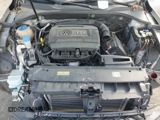 2014 Volkswagen Passat SE z VIN 1VWBT7A3XEC038811, wystawiony jako Copart lot #55198795 z przebiegiem 119 497 mil mil oraz Szkoda całkowita • Salvage title. Historia ofert i sprzedaży dostępna na DreamBid. Obrazek 11.