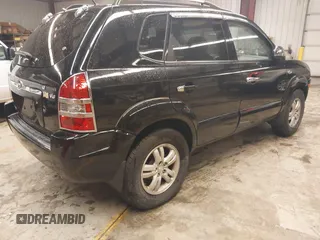 2007 Hyundai Tucson SE with VIN KM8JN12D97U636846, listed as a IAAI auction lot 41818368 with 199,996 mi miles. Bid and sale history available at carsss.com. Image 4.