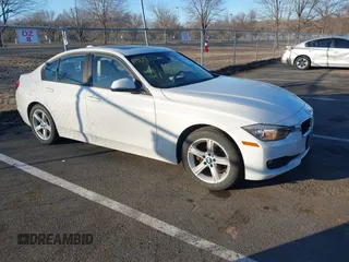 2014 BMW 3 Series 328i xDrive with VIN WBA3B5G58ENS08415, listed as a IAAI auction lot 41642668 with 51,563 mi miles and . Bid and sale history available at DreamBid. Image 1.