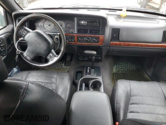 1998 Jeep Grand Cherokee with VIN 1J4FX48S1WC244308, listed as a Copart auction lot 74384714 with Not provided miles and Non repairable. Bid and sale history available at DreamBid. Image 8.