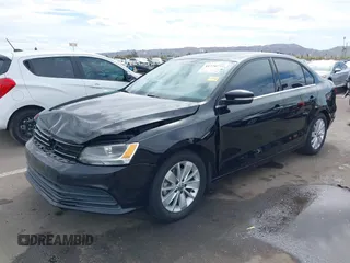 2015 Volkswagen Jetta Sedan 1.8T SE with VIN 3VWD17AJ9FM341950, listed as a IAAI auction lot 41778772 with 121,954 mi miles. Bid and sale history available at carsss.com. Image 2.