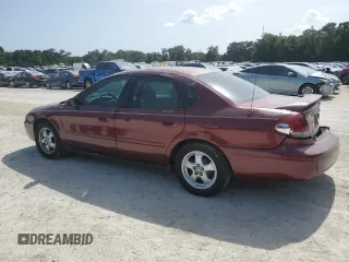 2007 Ford Taurus SE with VIN 1FAFP53U17A151246, listed as a Copart auction lot 60221955 with 284,321 mi miles and Salvage title. Bid and sale history available at DreamBid. Image 2.