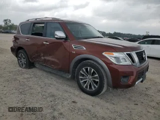 2017 Nissan Armada SL with VIN JN8AY2NDXH9008199, listed as a Copart auction lot 50427455 with 170,542 mi miles and Salvage Title. Bid and sale history available at carsss.com. Image 4.