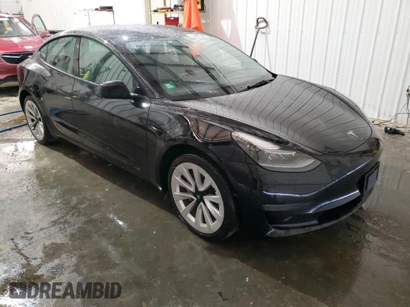 2023 Tesla Model 3 with VIN 5YJ3E1EA8PF451324, listed as a Copart auction lot 88318475 with 74,582 mi miles and Salvage Title. Bid and sale history available at DreamBid. Image 4.