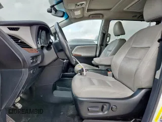 2015 Toyota Sienna XLE with VIN 5TDYK3DC4FS617099, listed as a Copart auction lot 61128025 with 114,508 mi miles and Salvage title. Bid and sale history available at DreamBid. Image 7.