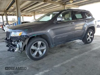 2014 Jeep Grand Cherokee Limited with VIN 1C4RJFBG7EC588986, listed as a Copart auction lot 52284405 with 92,702 mi miles and Salvage Title. Bid and sale history available at DreamBid. Image 1.