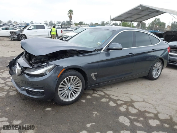 2015 BMW 3 Series Gran Turismo 328i xDrive with VIN WBA3X5C50FD559804, listed as a IAAI auction lot 41902204 with 88,891 mi miles. Bid and sale history available at carsss.com. Image 2.
