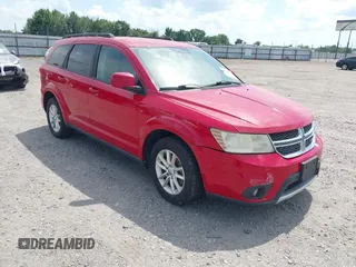 2013 Dodge Journey SXT with VIN 3C4PDDBGXDT641427, listed as a IAAI auction lot 42604902 with 149,256 mi miles and . Bid and sale history available at DreamBid. Image 1.