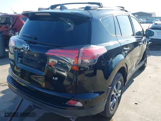 2017 Toyota RAV4 LE with VIN 2T3ZFREV8HW388357, listed as a IAAI auction lot 41674073 with 100,344 mi miles. Bid and sale history available at carsss.com. Image 4.