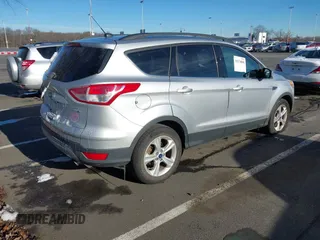 2014 Ford Escape SE with VIN 1FMCU9G97EUC53967, listed as a IAAI auction lot 41176868 with 176,413 mi miles. Bid and sale history available at carsss.com. Image 4.