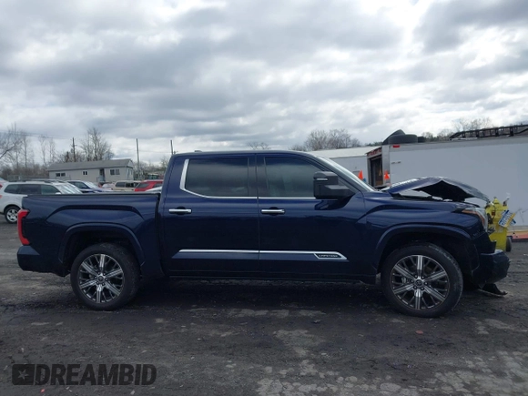 2022 Toyota Tundra Capstone Hybrid with VIN 5TFVC5DB5NX009829, listed as a IAAI auction lot 41983391 with 70,015 mi miles and . Bid and sale history available at DreamBid. Image 13.