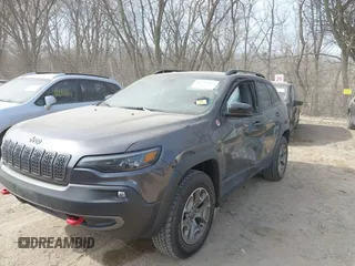 2022 Jeep Cherokee Trailhawk with VIN 1C4PJMBX4ND536592, listed as a IAAI auction lot 41792322 with 43,611 mi miles and . Bid and sale history available at DreamBid. Image 6.