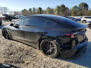 2024 Tesla Model 3 Long Range with VIN 5YJ3E1EB8RF756012, listed as a Copart auction lot 49694515 with 16,041 mi miles and Salvage Title. Bid and sale history available at DreamBid. Image 2.