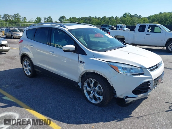 2014 Ford Escape Titanium с VIN 1FMCU0J94EUB92694, выставлен на аукционе IAAI как лот 42124647 с пробегом 107 666 миль миль и . История ставок и продаж доступна на DreamBid. Изображение 1.