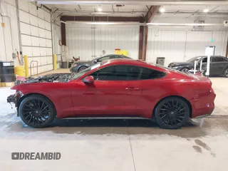 2017 Ford Mustang V6 z VIN 1FA6P8AMXH5309985, wystawiony jako IAAI lot #41501211 z przebiegiem 63 885 mil mil oraz . Historia ofert i sprzedaży dostępna na DreamBid. Obrazek 15.