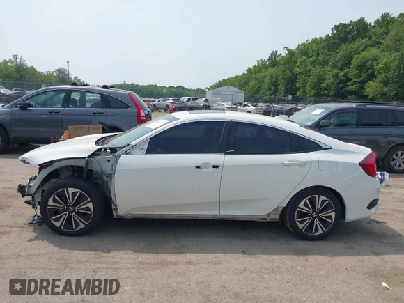 2016 Honda Civic EX-L z VIN 2HGFC1F79GH637326, wystawiony jako IAAI lot #42438274 z przebiegiem 215 846 mil mil oraz . Historia ofert i sprzedaży dostępna na DreamBid. Obrazek 15.