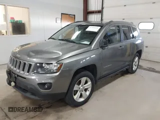 2014 Jeep Compass Sport with VIN 1C4NJDBB5ED567863, listed as a IAAI auction lot 41704644 with 163,405 mi miles. Bid and sale history available at carsss.com. Image 2.