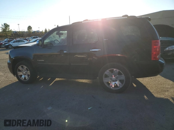 2011 GMC Yukon SLT with VIN 1GKS1CE01BR391954, listed as a Copart auction lot 82570594 with 0 mi miles and Salvage Title. Bid and sale history available at carsss.com. Image 2.