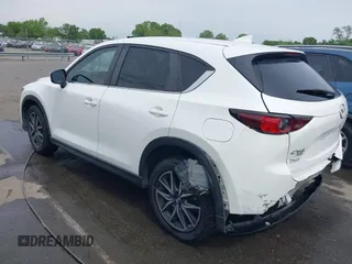 2018 Mazda CX-5 Touring with VIN JM3KFBCMXJ0366008, listed as a IAAI auction lot 42079989 with 153,868 mi miles and . Bid and sale history available at DreamBid. Image 3.