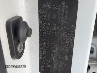 2013 Kia Optima LX z VIN KNAGM4A76D5372356, wystawiony jako Copart lot #57652125 z przebiegiem Nie podano mil oraz Szkoda całkowita • Salvage title. Historia ofert i sprzedaży dostępna na DreamBid. Obrazek 13.