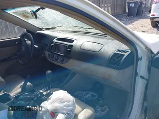 2002 Toyota Camry XLE z VIN JTDBF30K820027492, wystawiony jako IAAI lot #42158162 z przebiegiem 224 291 mil mil oraz . Historia ofert i sprzedaży dostępna na DreamBid. Obrazek 5.