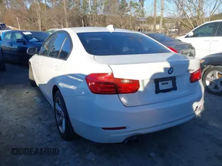 2014 BMW 3 Series 328i with VIN WBA3C1C58EK109865, listed as a IAAI auction lot 41290811 with 146,258 mi miles. Bid and sale history available at carsss.com. Image 3.