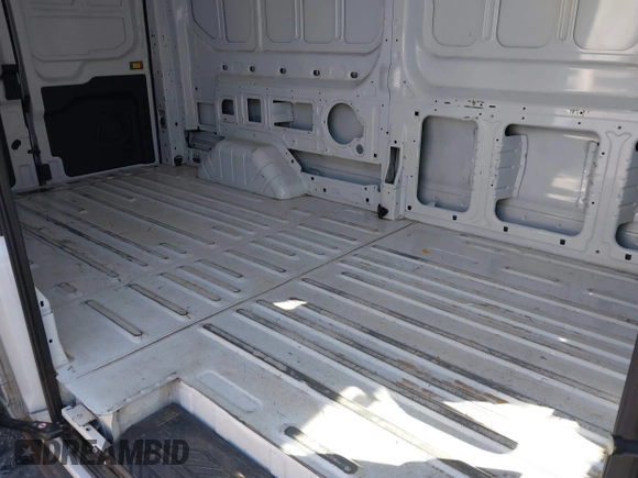 2023 Ford Transit Cargo with VIN 1FTBR2C8XPKA33372, listed as a IAAI auction lot 41735299 with 56,777 mi miles and . Bid and sale history available at DreamBid. Image 8.