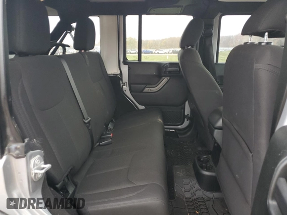 2018 Jeep Wrangler JK Unlimited Sport S with VIN 1C4BJWDG2JL908286, listed as a Copart auction lot 77313844 with 69,497 mi miles and Salvage Title. Bid and sale history available at carsss.com. Image 11.