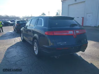 2018 Lincoln MKT with VIN 2LMHJ5NK7JBL00156, listed as a IAAI auction lot 41669010 with 345,661 mi miles. Bid and sale history available at carsss.com. Image 3.