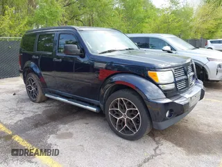 2011 Dodge Nitro Heat with VIN 1D4PU4GX2BW514237, listed as a IAAI auction lot 42109697 with 151,365 mi miles. Bid and sale history available at carsss.com. Image 1.