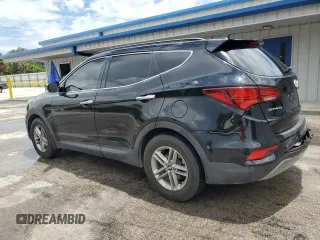 2017 Hyundai Santa Fe 2.4L with VIN 5NMZUDLB8HH048454, listed as a Copart auction lot 64727415 with 82,828 mi miles and Salvage title. Bid and sale history available at DreamBid. Image 2.