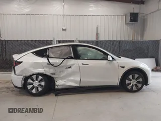 2020 Tesla Model Y Long Range z VIN 5YJYGDEE8LF054338, wystawiony jako IAAI lot #39026888 z przebiegiem 86 142 mil mil oraz . Historia ofert i sprzedaży dostępna na DreamBid. Obrazek 12.