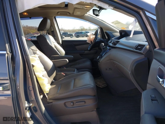 2016 Honda Odyssey EX-L with VIN 5FNRL5H6XGB020370, listed as a IAAI auction lot 41843941 with 189,980 mi miles. Bid and sale history available at carsss.com. Image 5.