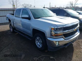 2017 Chevrolet Silverado 1500 LT with VIN 3GCUKREH4HG348602, listed as a IAAI auction lot 41235501 with 161,289 mi miles and . Bid and sale history available at DreamBid. Image 1.