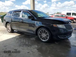 2014 Lincoln MKT EcoBoost with VIN 2LMHJ5AT7EBL50642, listed as a Copart auction lot 50880735 with 166,966 mi miles and Clean Title. Bid and sale history available at DreamBid. Image 4.