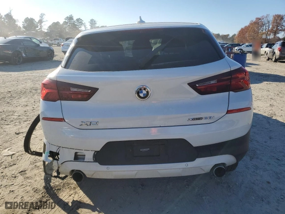 2021 BMW X2 xDrive28i with VIN WBXYJ1C00M5S24107, listed as a Copart auction lot 81824504 with 29,376 mi miles and Salvage Title. Bid and sale history available at carsss.com. Image 6.