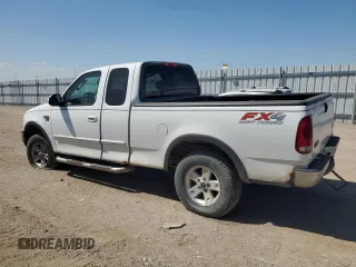 2003 Ford F-150 XL with VIN 2FTRX18L53CA29904, listed as a Copart auction lot 45022105 with 184,018 mi miles and Salvage title. Bid and sale history available at DreamBid. Image 2.