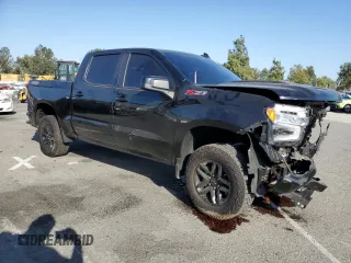 2023 Chevrolet Silverado 1500 LT Trail Boss with VIN 3GCUDFED8PG364449, listed as a Copart auction lot 71685704 with 13,637 mi miles and Salvage Title. Bid and sale history available at DreamBid. Image 4.