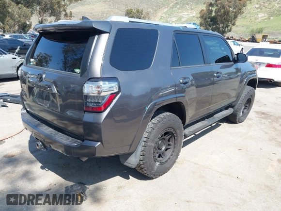 2016 Toyota 4Runner Limited with VIN JTEBU5JR2G5311140, listed as a IAAI auction lot 41973090 with 97,465 mi miles and . Bid and sale history available at DreamBid. Image 4.
